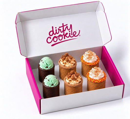 Pink Dirty Cookie gift box with six filled Cookie Shots topped with whipped cream and sprinkles