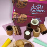 Dirty 10 gift box from Dirty Cookie with assorted cookie shots and stuffed cookies set out in front