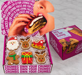 Dirty Cookie gift box holding six individually wrapped decorated Christmas cookies
